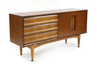 A teak and brass-mounted sideboard,