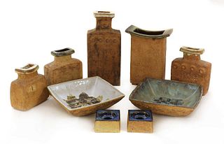 A collection of nine brutalist stoneware items,