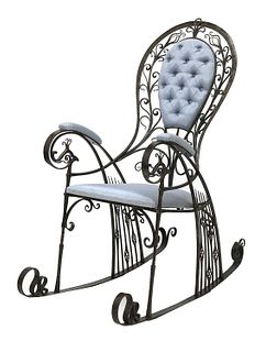 *The 'Peacock' iron rocking chair,