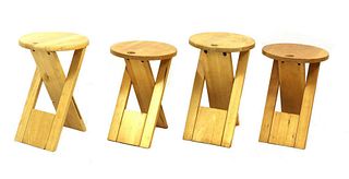 Four Roger Tallon folding stools,
