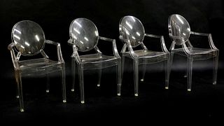 A set of four 'Louis Ghost' armchairs,