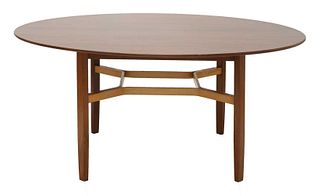 A walnut circular coffee table,