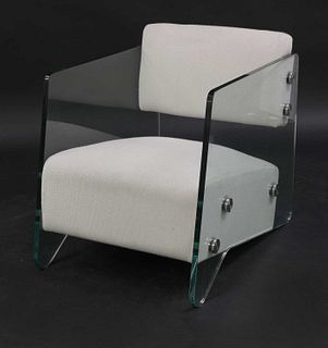 A contemporary glass armchair,