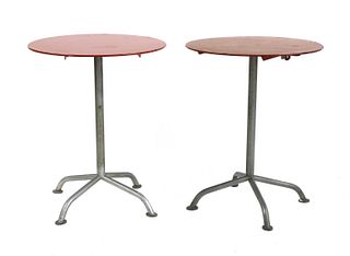 A pair of Bigla bistro tables,
