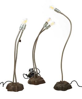 A set of three lamps,