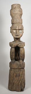Large antique ironwood Indonesian seated guardian figure, probably Timor