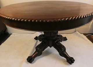CARVED MAHOGANY DINING TABLE