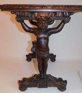 CHERUB CARVED MARBLE TOP TABLE