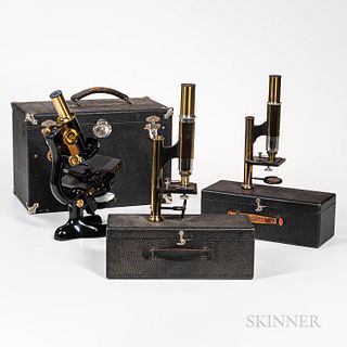 Two Unsigned Cased Traveling or Field Microscopes, and a Student Microscope