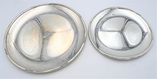 Two Large Sterling Silver Round Trays
each having near matching edge
marked sterling
diameter 15 3/4 inches
57.7 t.oz.