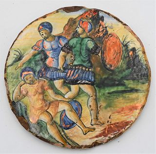 Italian Majolica Polychrome Decorated Pottery Plaque
mid 16th century
probably Castel Durante
circular
depicting two figures in antique dress
chipped 