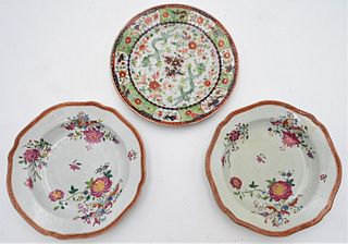 Three Chinese Porcelain Plates
to include a Famille Rose plate having painted enameled green dragons and red border
18th century
signed on bottom 
alo
