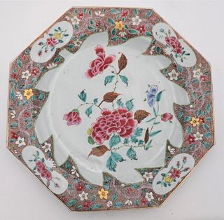 Chinese Export Famille Rose Porcelain Octagonal Charger
having painted enamel center flower, outer rim richly decorated with various flowers and panel