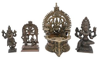 Four Piece Bronze Lot
to include sculptures of Hindu gods 
including two forms of Vishnu, a figure flanked by two elephants over a well
along with Gan