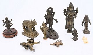 Nine Piece Bronze Lot
to include miniature sculptures of Hindu gods
including Ganesh, Vishnu, Kali, and a horned bull
tallest 5 1/2 inches