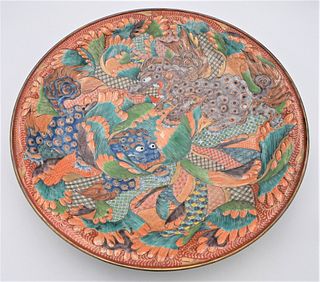 Large Japanese Arita Porcelain Charger
having polychrome and painted foo dogs, center decoration, exterior decorated with blue and iron red flowers
di