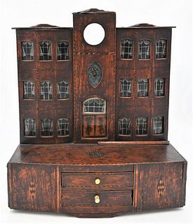 Inlaid Colonial Architectural Watch Hutch
in the form of a colonial house having 20 reverse painted windows and doors set on a base having 2 drawers
1