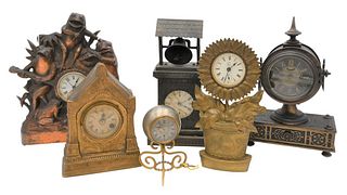 Group of Six Shelf Clocks
to include a brass sunflower novelty clock by Waterbury Clock Company; 
a clock with mechanical bell on top; 
a Terrigina "C