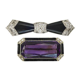 TWO ART DECO PLATINUM BROOCHES WITH ONYX OR ENAMEL