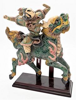 Chinese Glazed Roof Tile
depicting a warrior on a foo lion
height 14 inches, length 11 inches