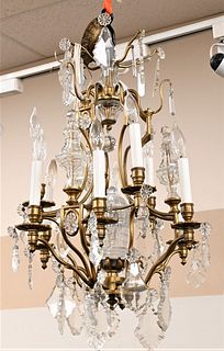 Ten Light Brass and Crystal Chandelier
height 24 inches, diameter 18 inches