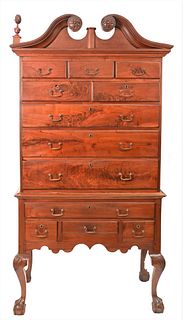 Pennsylvania Walnut Highboy
having broken arch top over case of drawers set on lower section of four drawers on fan carved cabriole legs ending in bal