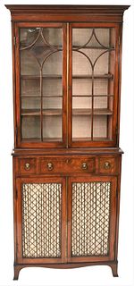 George IV Mahogany Cabinet in Two Parts
top section having two glazed doors
on lower section with one drawer over two frill work doors
all set on Fren