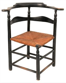 Queen Anne Corner Chair
having rush seat, old black paint over red finish
height 33 1/2 inches, seat height 17 1/4 inches
Provenance: Peter Eaton Anti