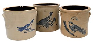 Three Stoneware Crocks having blue bird on branch along with a 2 gallon and 1 1/2 gallonheight 9 1/4 inchesProvenance: Estate of Bruce Sasalla, East H