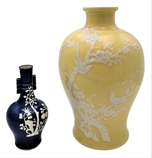 Two Chinese Porcelain Pate-Sur-Pate Vases
yellow glazed with blossoming apple tree and birds having drilled bottom
along with dark blue glazed vase wi
