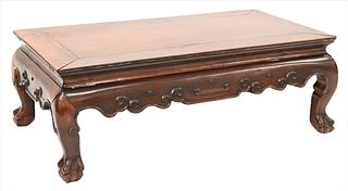 Chinese Hardwood Low Table
on carved claw feet
height 11 inches, top 16 1/4 x 30 1/4 inches