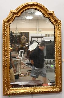 Continental Framed Mirror
having carved giltwood gesso frame
42 1/2 x 28 inches 
Provenance: From a private New York City collection.