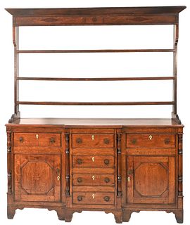 English Oak Welsh Cupboard In Two Parts
having upper section with open shelves on lower section having doors and drawers
height 82 inches, total width