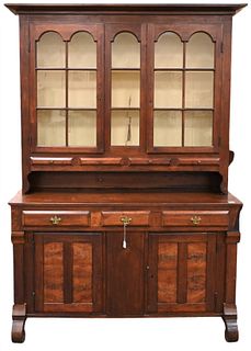 Walnut Pennsylvania Stepback Cupboard
in two parts, upper section having two doors and four small drawers
lower section having three drawers and two d