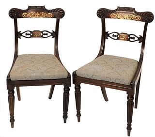 Set of Six Rosewood Classical Side Chairs
having inlaid brass decoration and openwork carving all set on reeded and turned legs
circa 1830
now with up