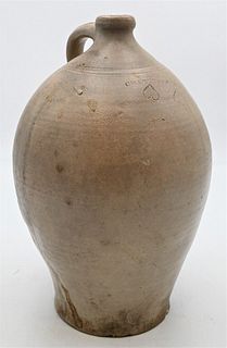 Charlestown Stoneware Jug
having two incised hearts 
height 15 1/2 inches
Provenance: Estate of Bruce Sasalla, East Hartford, Connecticut.
