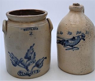 Two Piece Stoneware Lot
to include one jug with blue bird 
along with two gallon crock having blue flowers
marked cortland