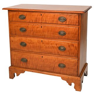 Chippendale Maple and Tiger Maple Chesthaving tiger maple drawers all set on bracket feetcirca 1770height 38 inches, width 36 3/4 inches, top 19 1