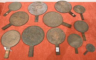 Group of 12 Japanese Bronze Mirrors
five having landscape scene
tallest 13 inches