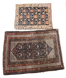 Two Caucasian Oriental Throw Rugs
having wear
4' x 5' 2" and 5' 2" x 7' 2"
Provenance: The Estate of Diana Atwood Johnson.