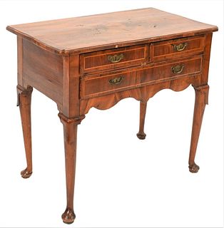 Queen Anne Burlwood Dressing Tablehaving two short drawers over one long drawer, legs ending in pad feetheigth 28 inches, top 19 x 32 inches