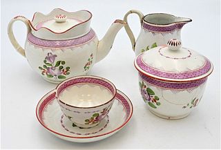 22 Piece Set of Soft Paste 
to include teapot, creamer, covered sugar bowl, ten saucers, and nine cups,
damage to creamer handles, sugar, several cups