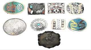 Nine Large Belt Buckles
to include eight silver
along with one brass marked Tiffany Studios N.Y.
Southwest, US or Mexico
longest length 4 inches