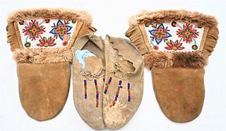 Pair of Beaded Hyde Mittens and Beaded Decorated Moccasins
length of moccasins 11 inches