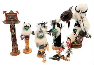 10 Piece Lot 
to include 9 Kachina dolls along with a totem marked Gavlene Tungovia Tewa Pal - Hikmana
butterfly maiden