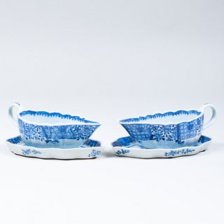 Pair of Chinese Export Blue and White Porcelain Sauce Boats and a Pair of Leaf Shaped Dishes