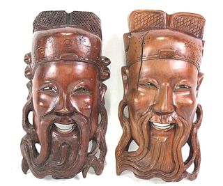 TWO ANTIQUE CHINESE CARVED ROSEWOOD MASKS