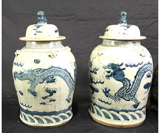 PAIR OF CHINESE BLUE AND WHITE LIDDED DRAGON JARS