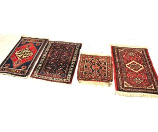LOT OF FOUR PERSIAN HAND LOOMED SMALL RUGS