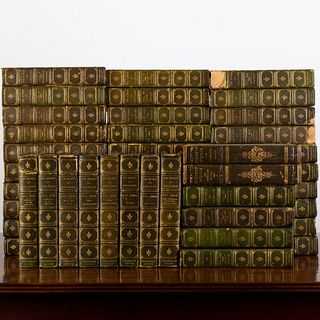 The Works of Voltaire and Two Volumes of Dickens' Works